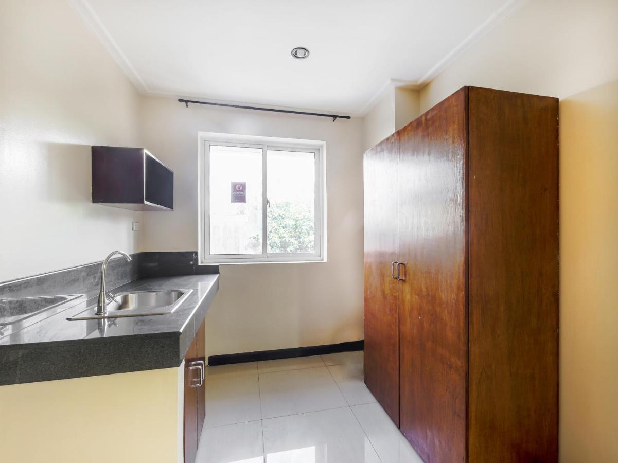 Oyo 842 City Smiles Apartelle San Juan  Экстерьер фото